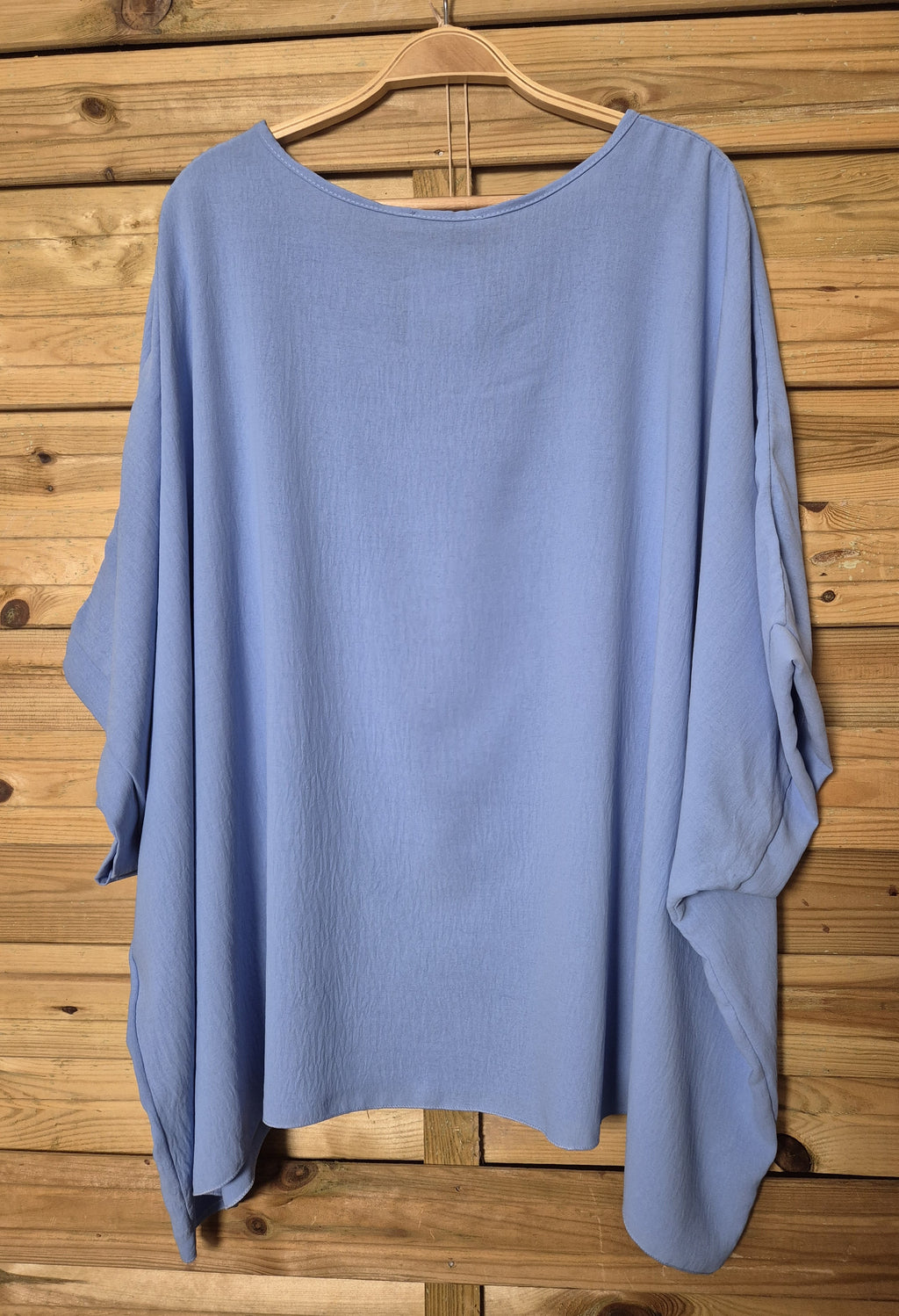 Blusa amplia con colgante incluido · Talla única XL–4XL