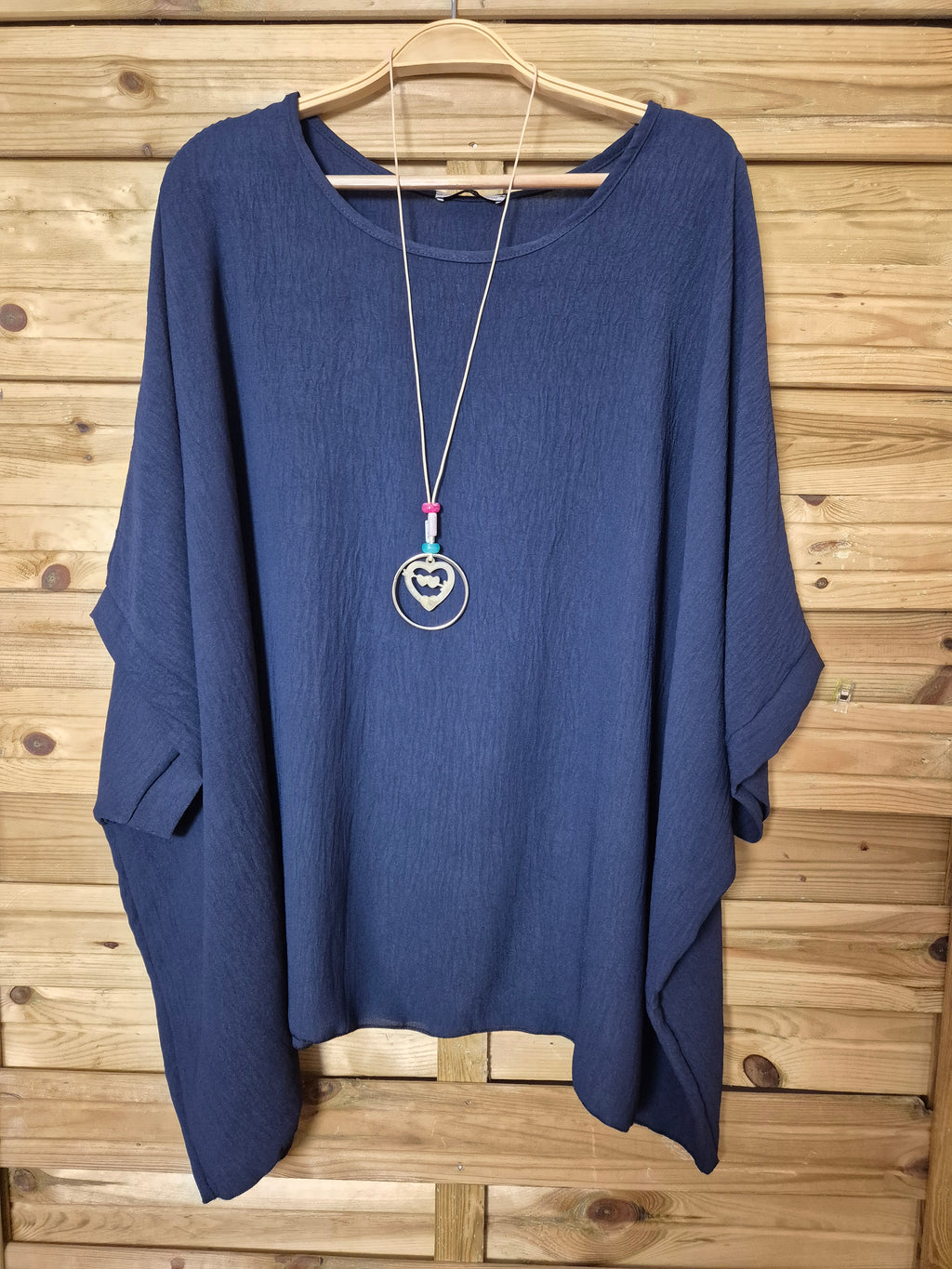 Blusa amplia con colgante incluido · Talla única XL–4XL