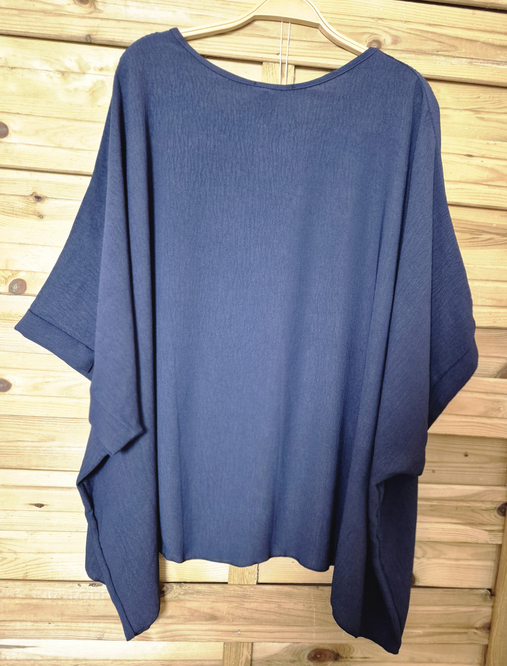 Blusa amplia con colgante incluido · Talla única XL–4XL