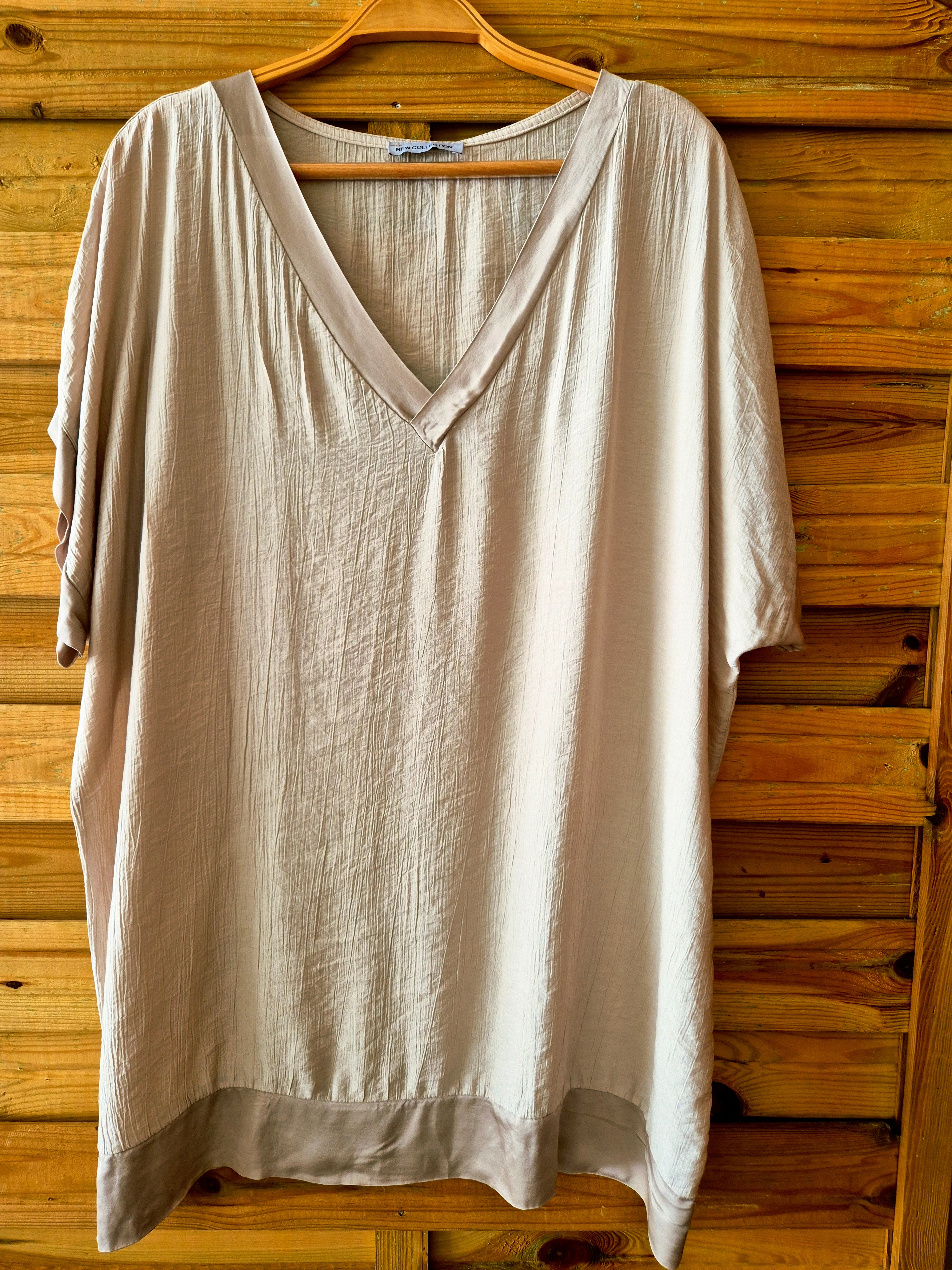 Blouse ample avec détail en satin · Taille unique XL–3XL