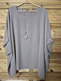 Blusa amplia con colgante incluido · Talla única XL–4XL