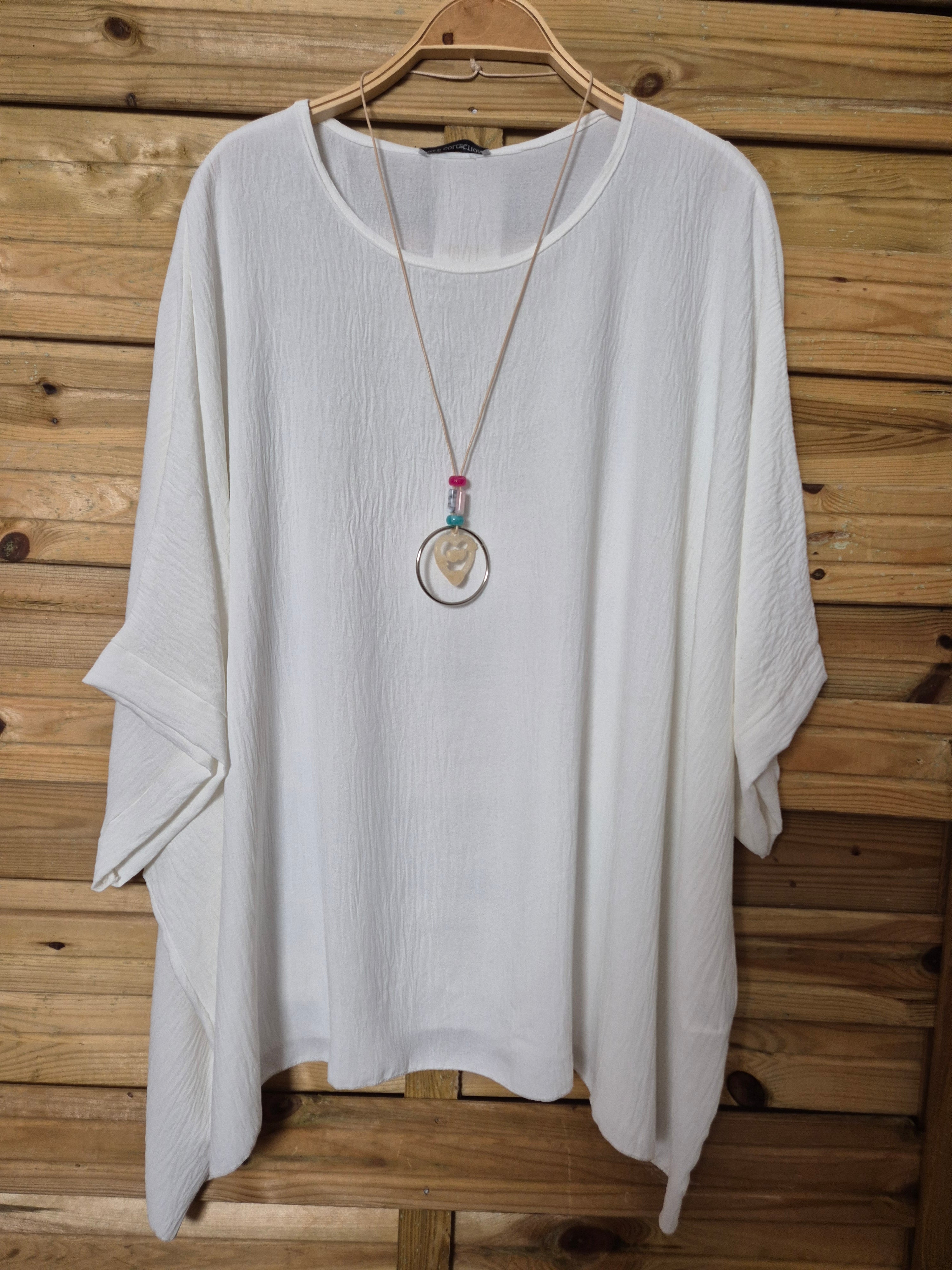 Blusa amplia con colgante incluido · Talla única XL–4XL