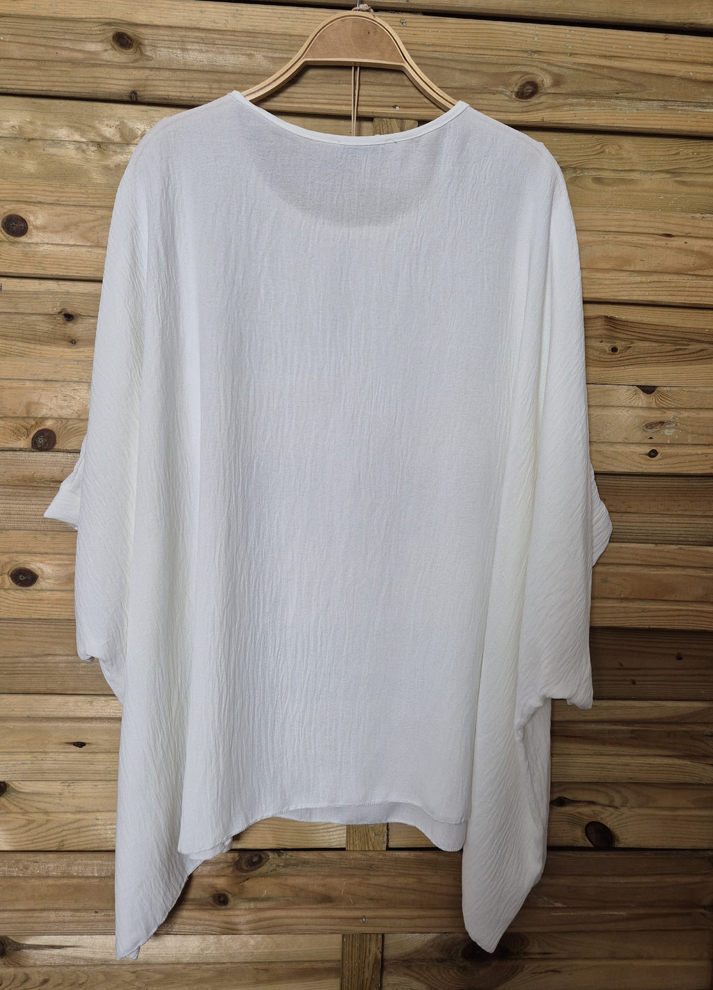 Blusa amplia con colgante incluido · Talla única XL–4XL