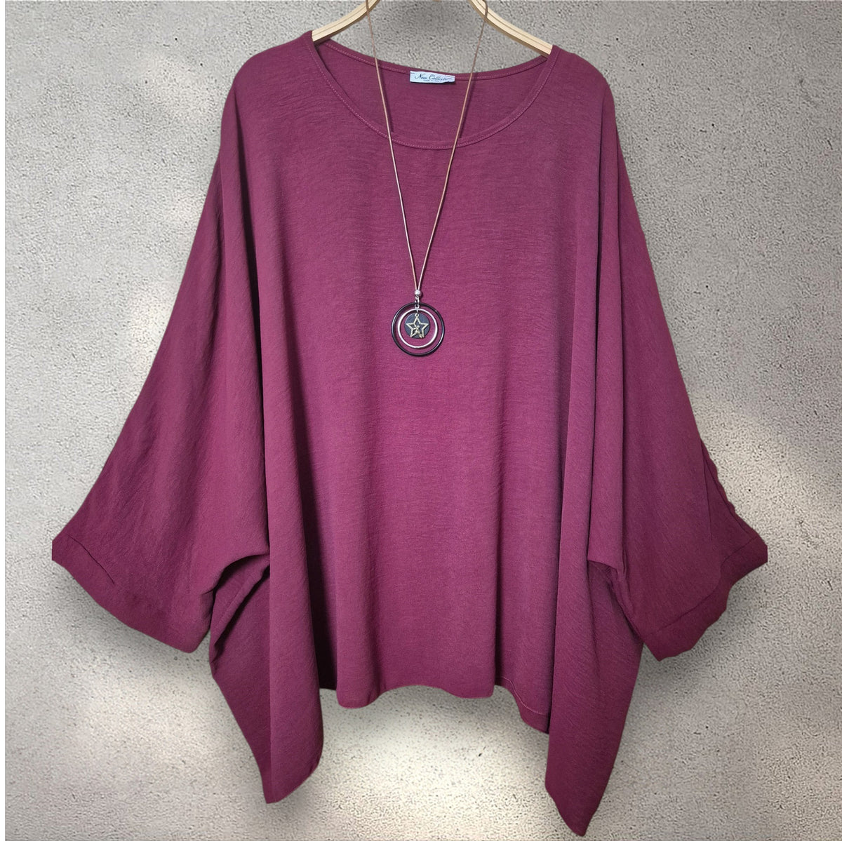 Blusa amplia burdeos
