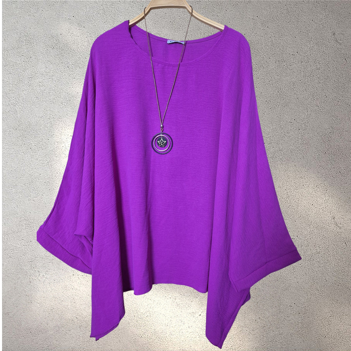 Blusa amplia fuscia