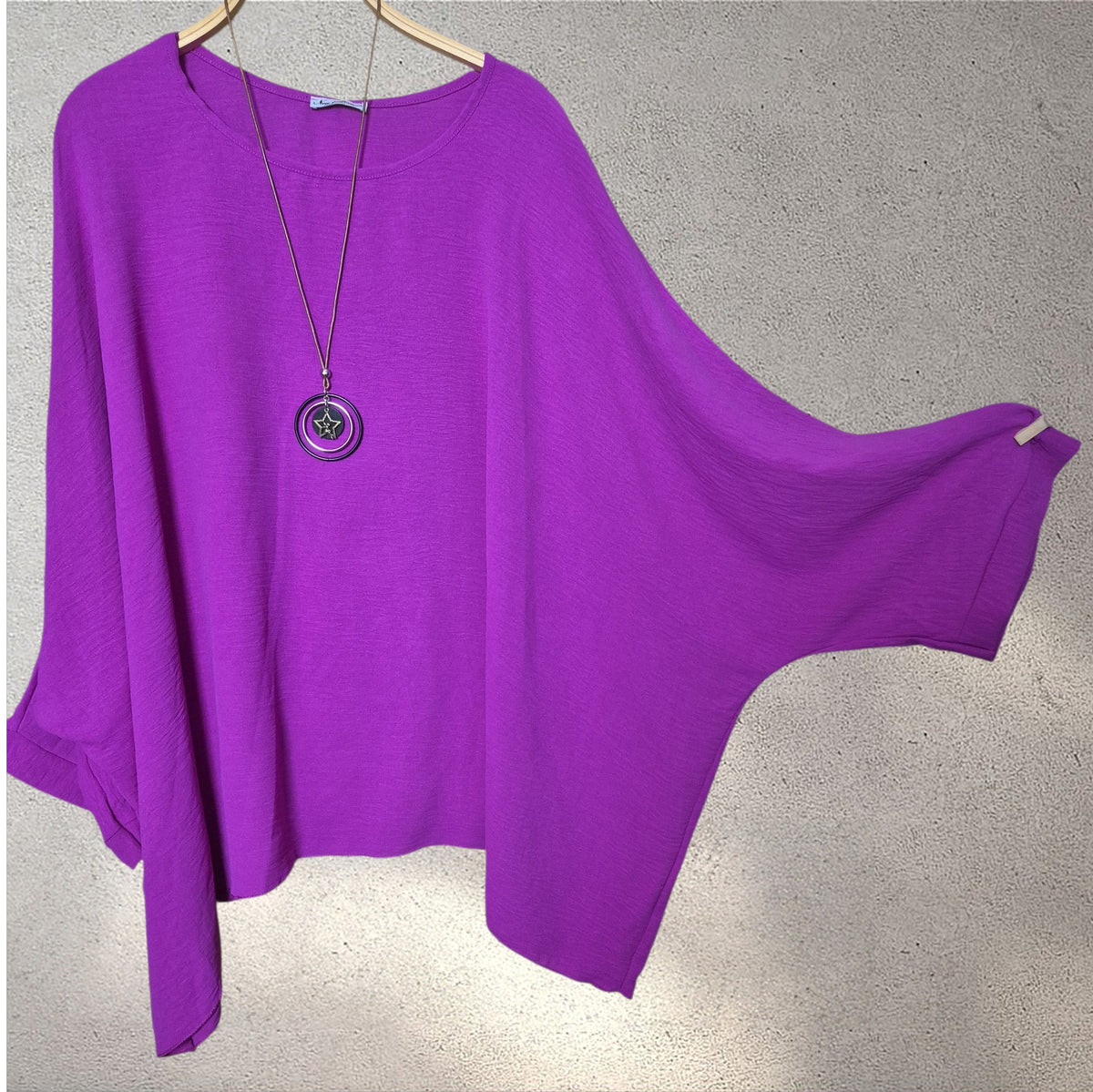 Blusa amplia fuscia