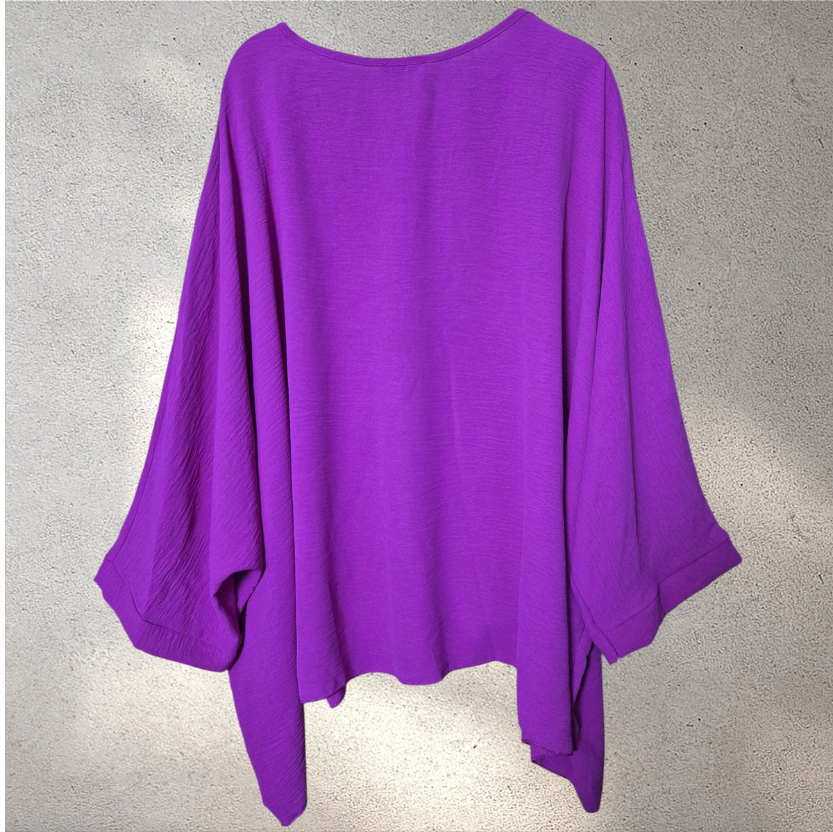 Blusa amplia fuscia