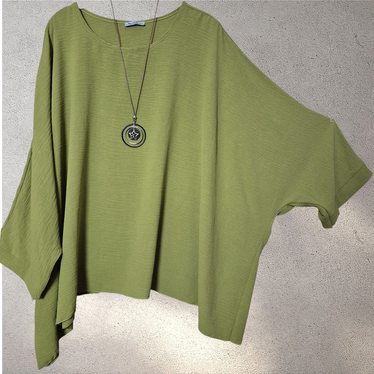 Blusa amplia pistacho