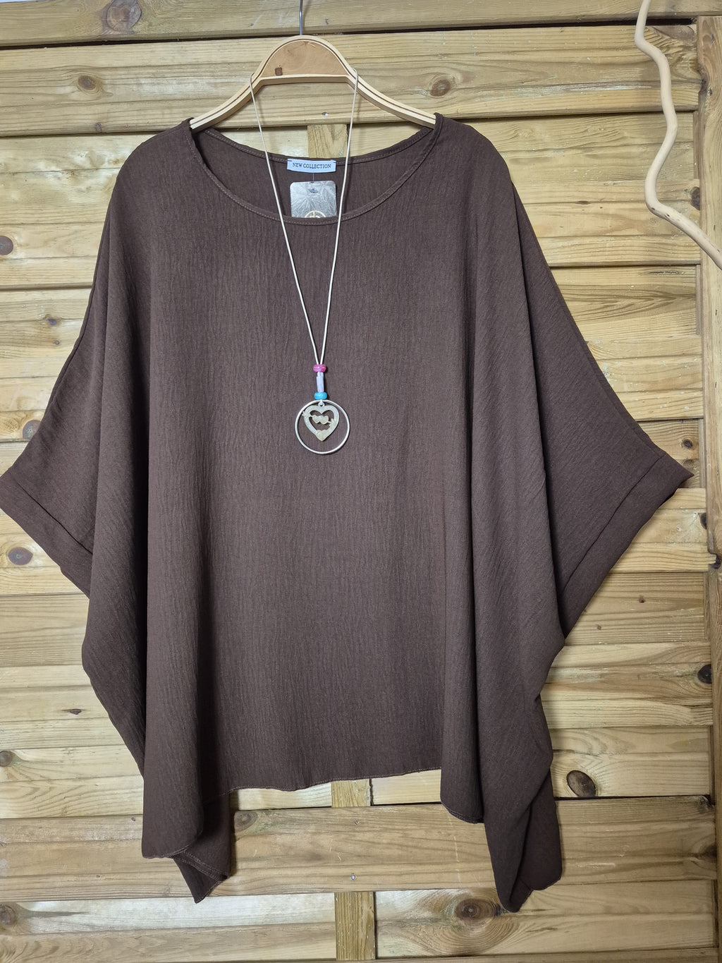 Blusa amplia con colgante incluido · Talla única XL–4XL