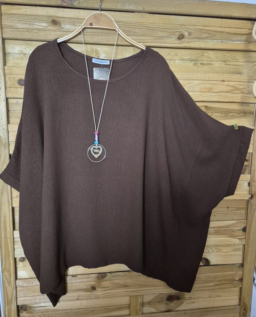 Blusa amplia con colgante incluido · Talla única XL–4XL