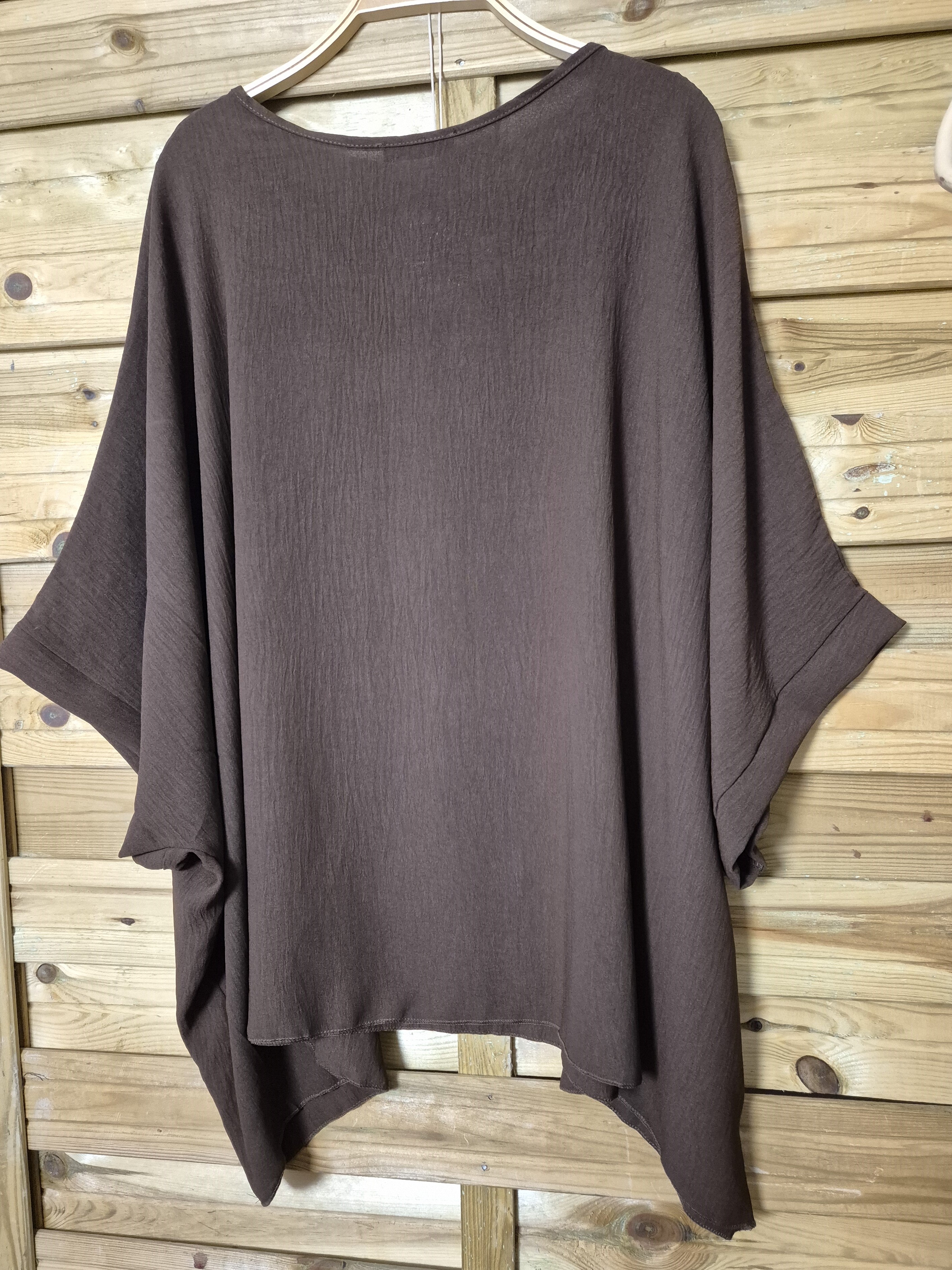 Blusa amplia con colgante incluido · Talla única XL–4XL