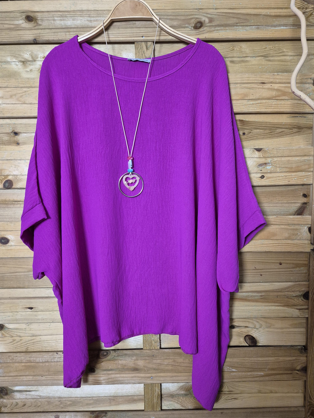 Blusa amplia con colgante incluido · Talla única XL–4XL