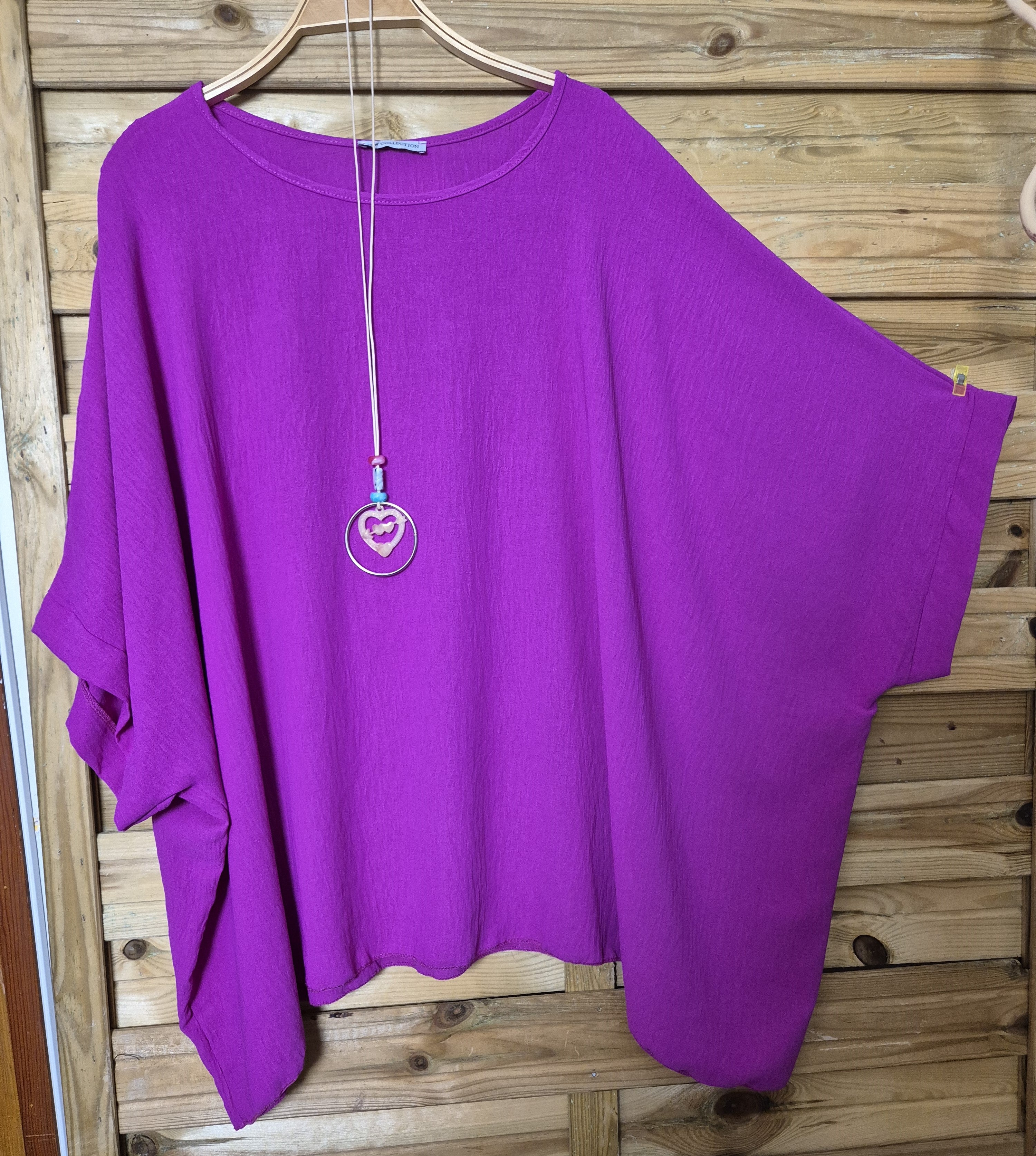 Blusa amplia con colgante incluido · Talla única XL–4XL