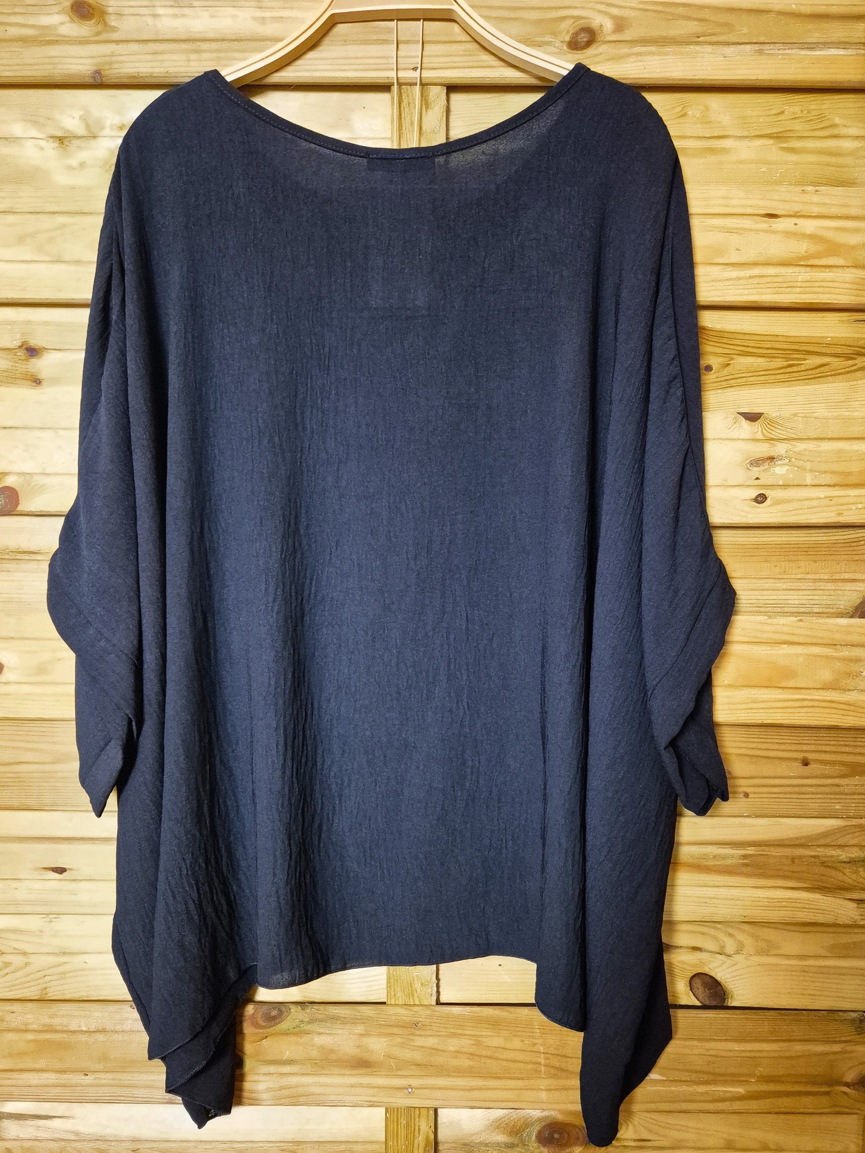 Blusa amplia con colgante incluido · Talla única XL–4XL