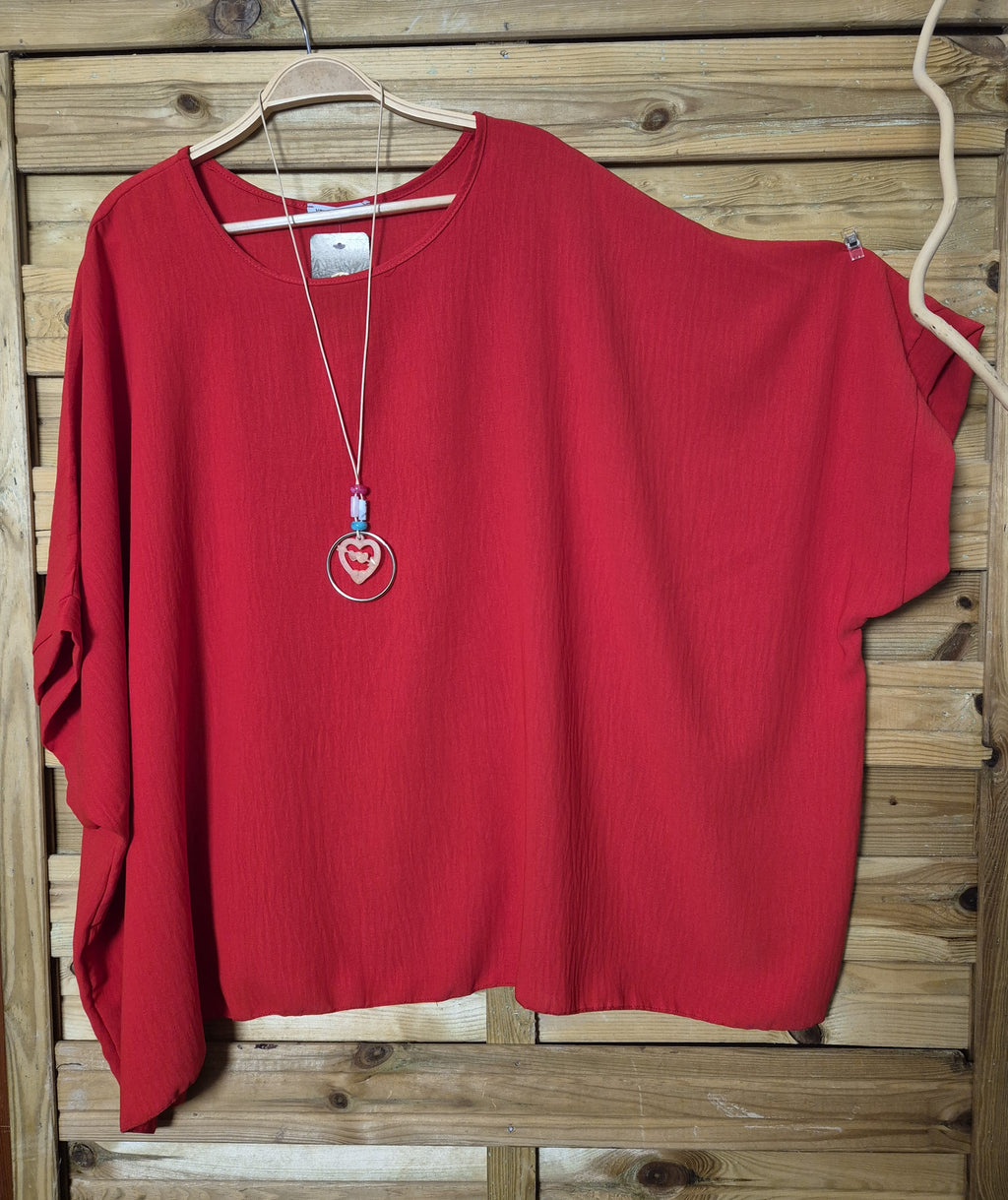 Blusa amplia con colgante incluido · Talla única XL–4XL