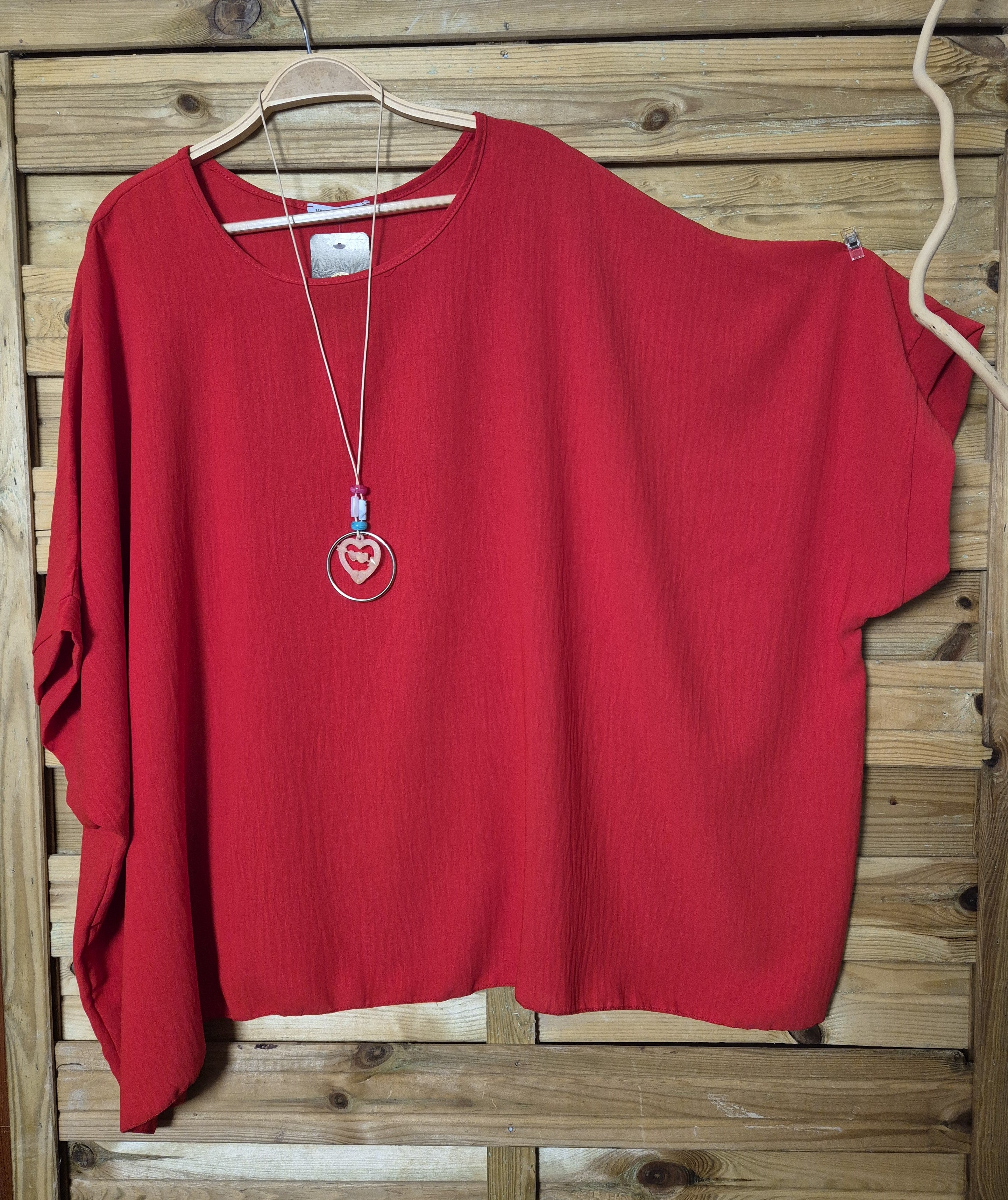 Blusa amplia con colgante incluido · Talla única XL–4XL