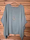 Blusa amplia con colgante incluido · Talla única XL–4XL